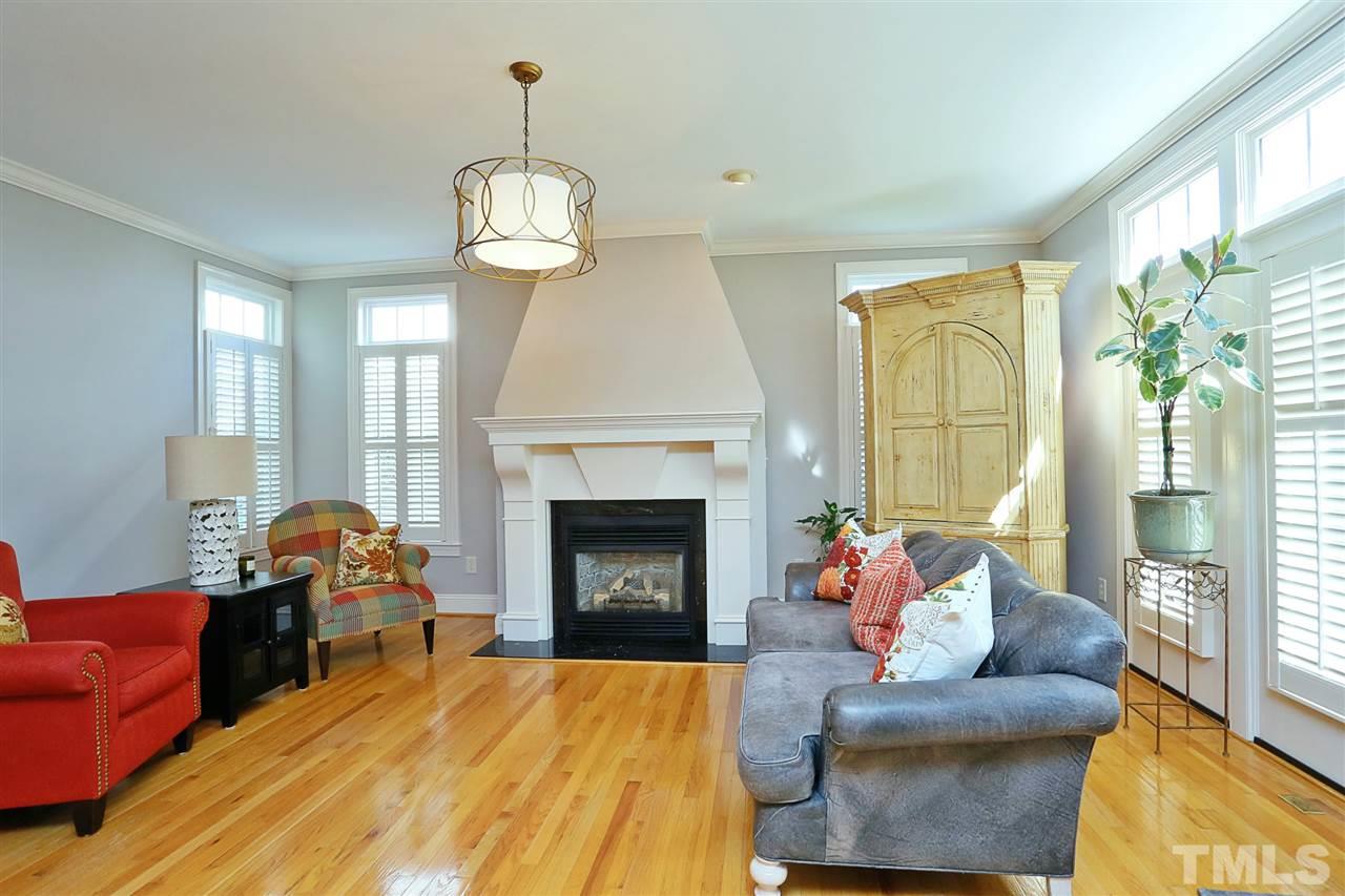 1164 Harp Street Raleigh, NC 27604 - Photo 12 of 25 a living room with furniture and a fireplace