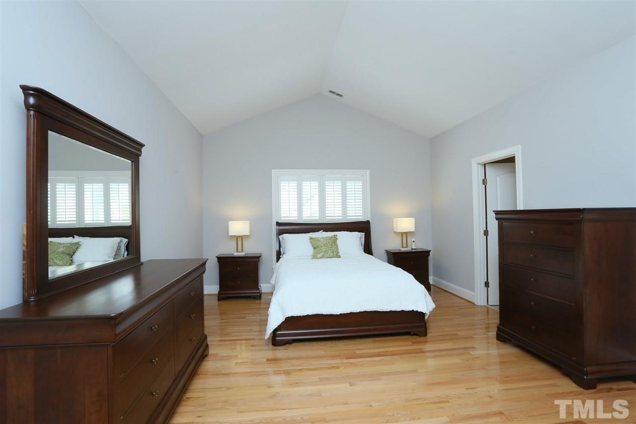 1164 Harp Street Raleigh, NC 27604 - Photo 16 of 25 a bedroom with a bed and window