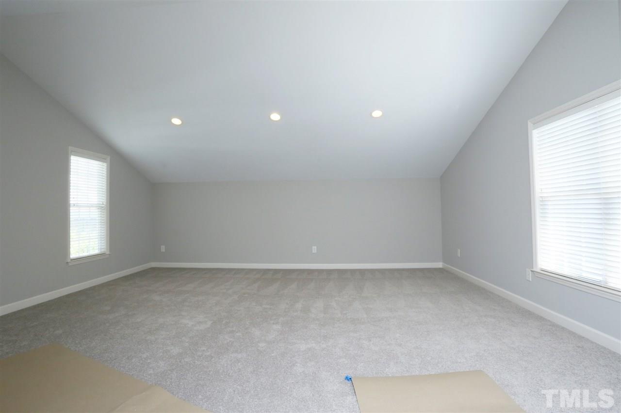 1164 Harp Street Raleigh, NC 27604 - Photo 25 of 25 an empty room with a window