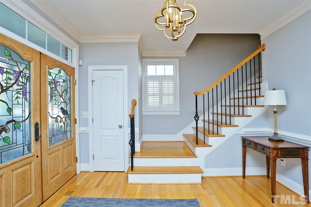 1164 Harp Street Raleigh, NC 27604 - Photo 4 of 25 a view of an entryway with wooden floor