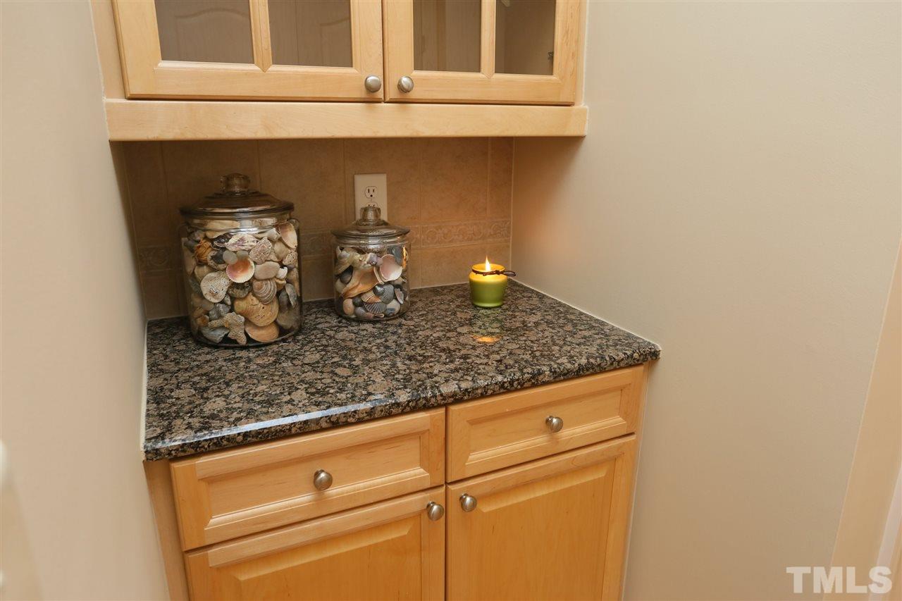1164 Harp Street Raleigh, NC 27604 - Photo 10 of 25 a kitchen with a sink and cabinets