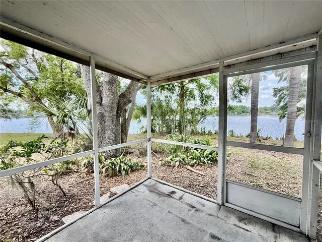 a view of a porch and garden