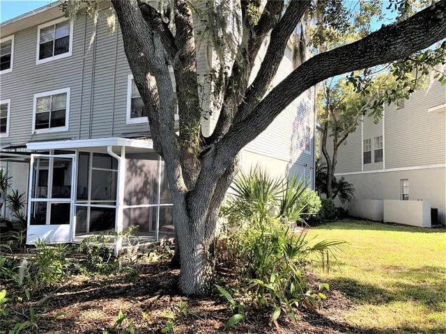 a house with trees in front of it