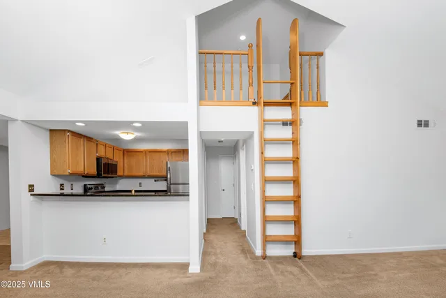 a view of kitchen and utility room