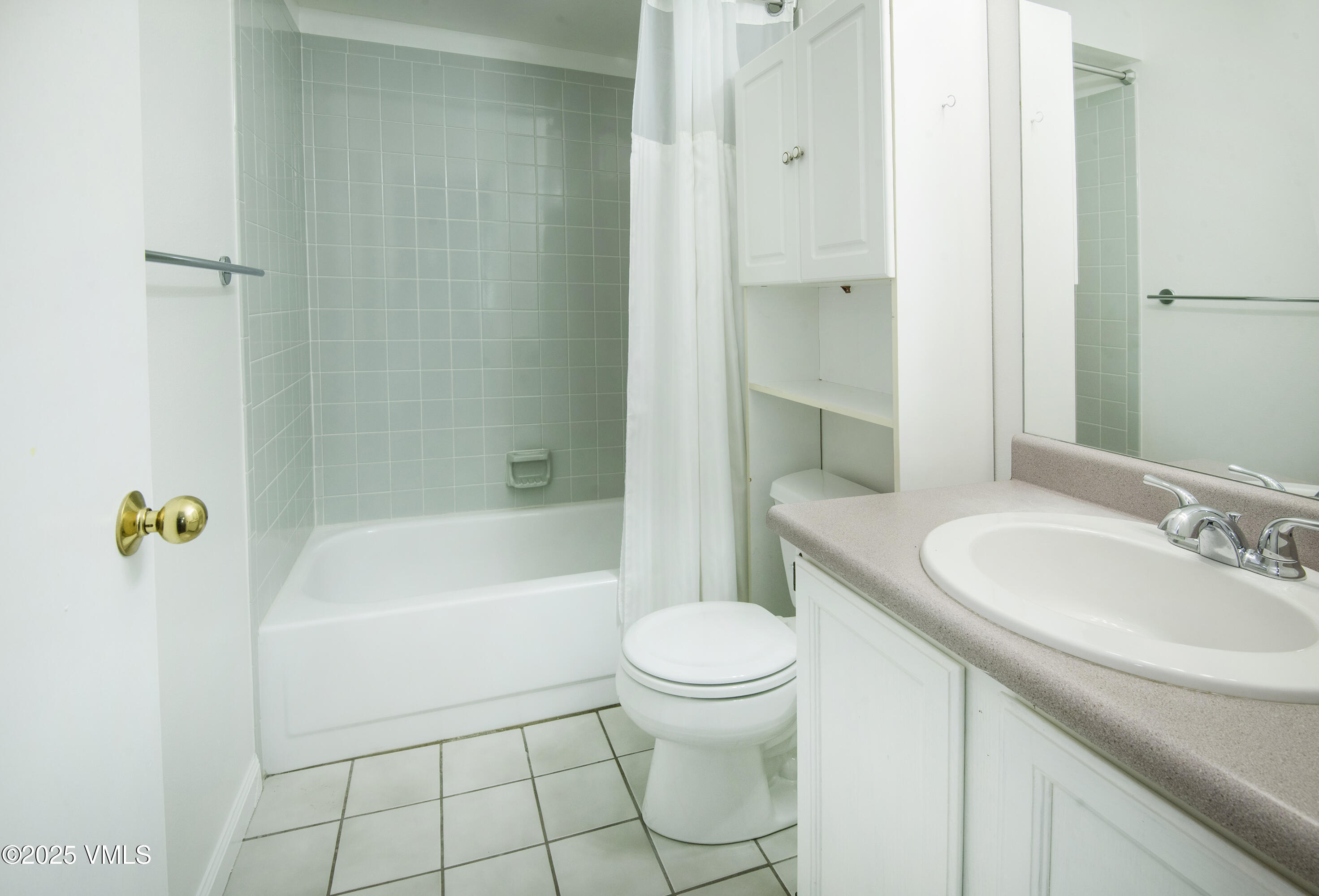 34999 Highway 6, Unit O303 Edwards, CO 81632 - Photo 16 of 35 a bathroom with a sink a toilet and shower