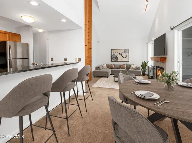 a living room with furniture and a table