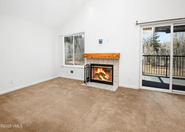 a view of a livingroom with a staircase
