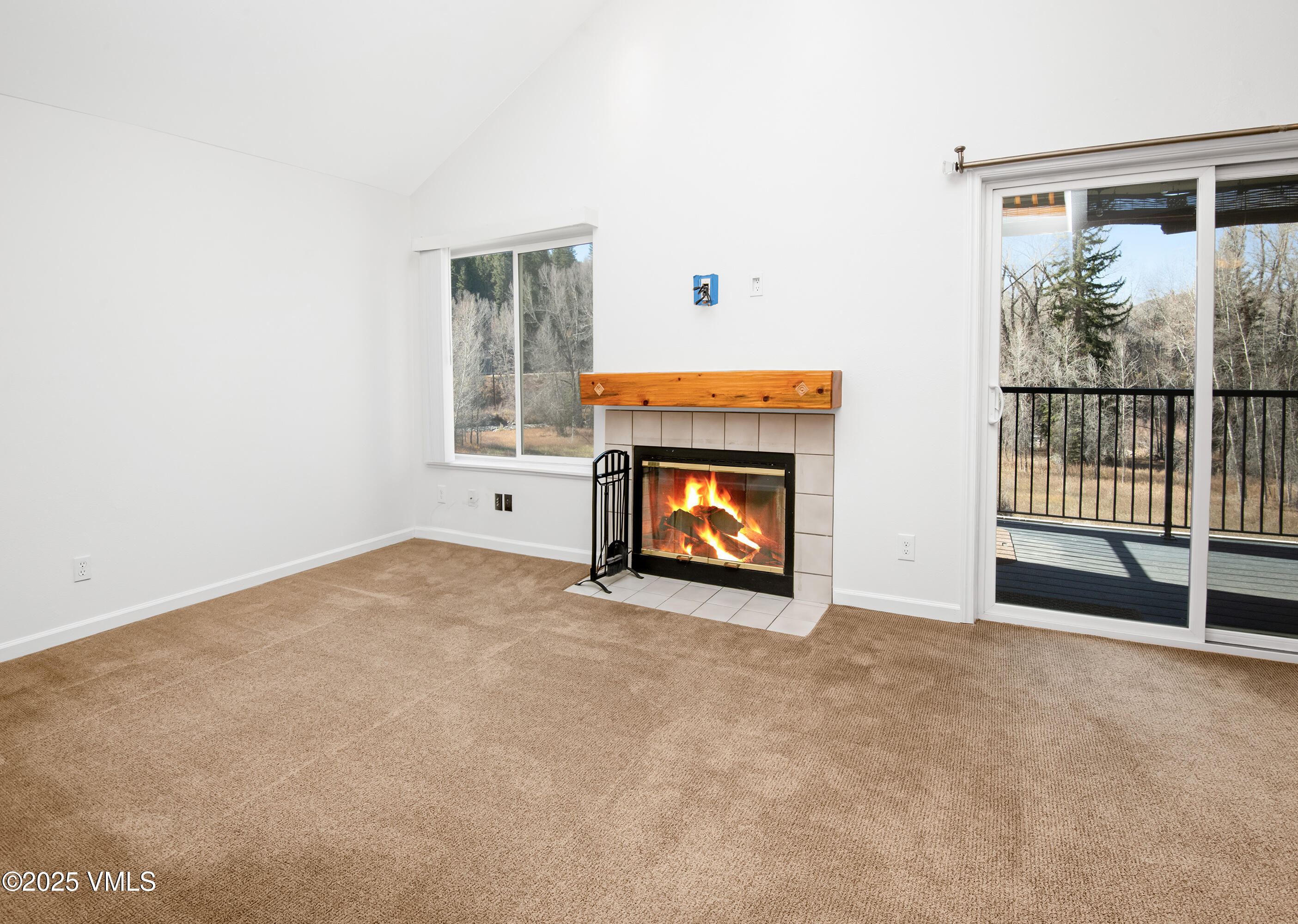 34999 Highway 6, Unit O303 Edwards, CO 81632 - Photo 22 of 35 a view of an empty room with a fireplace