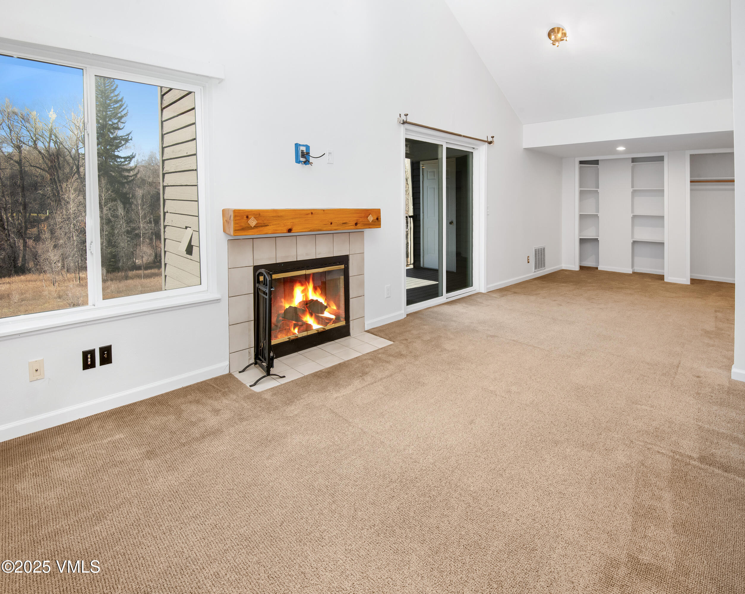 34999 Highway 6, Unit O303 Edwards, CO 81632 - Photo 24 of 35 a view of an empty room with a fireplace