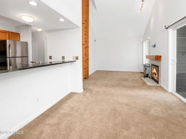 an empty room with shelves