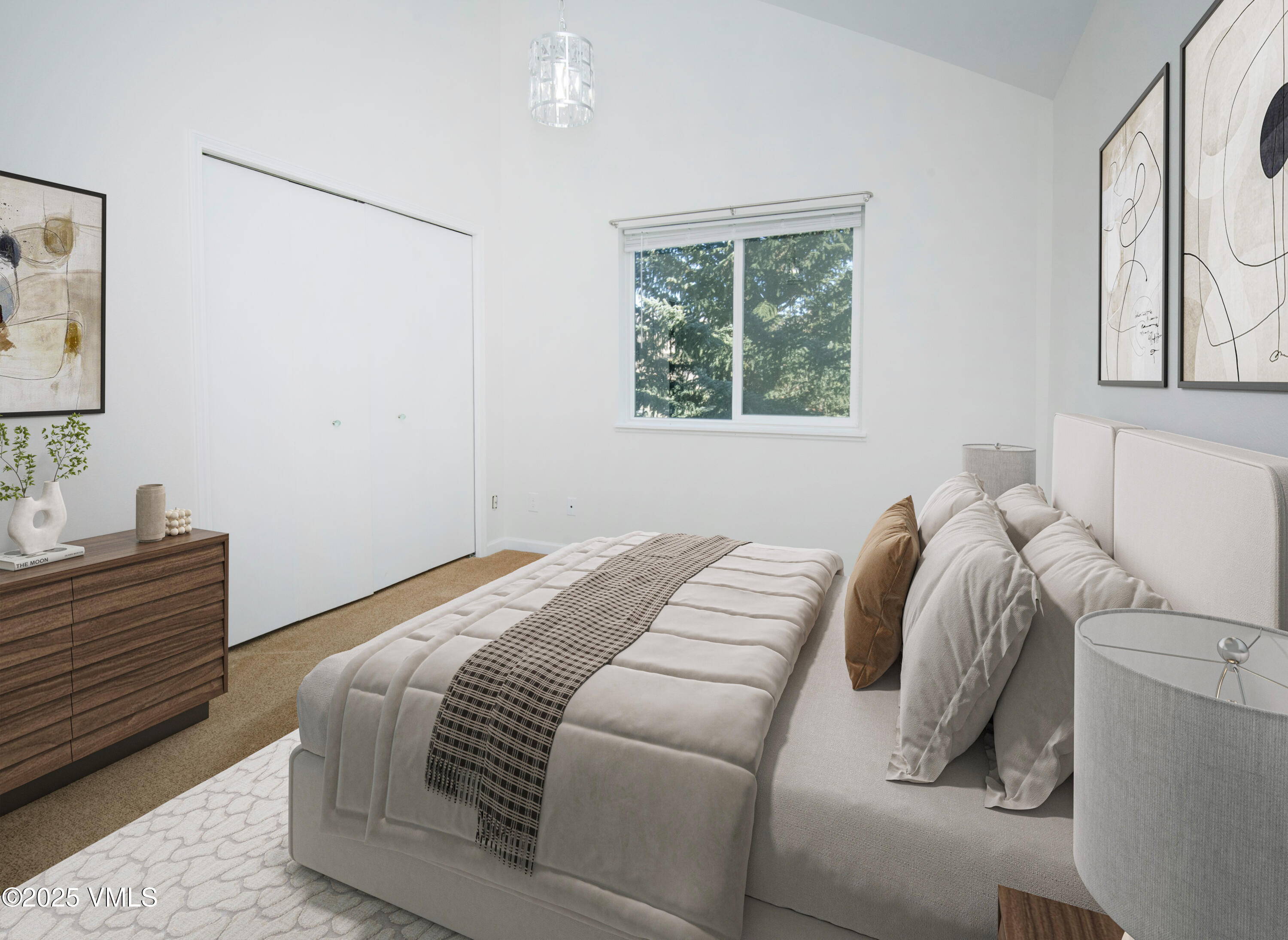 34999 Highway 6, Unit O303 Edwards, CO 81632 - Photo 6 of 35 a bed sitting in a bedroom next to a window