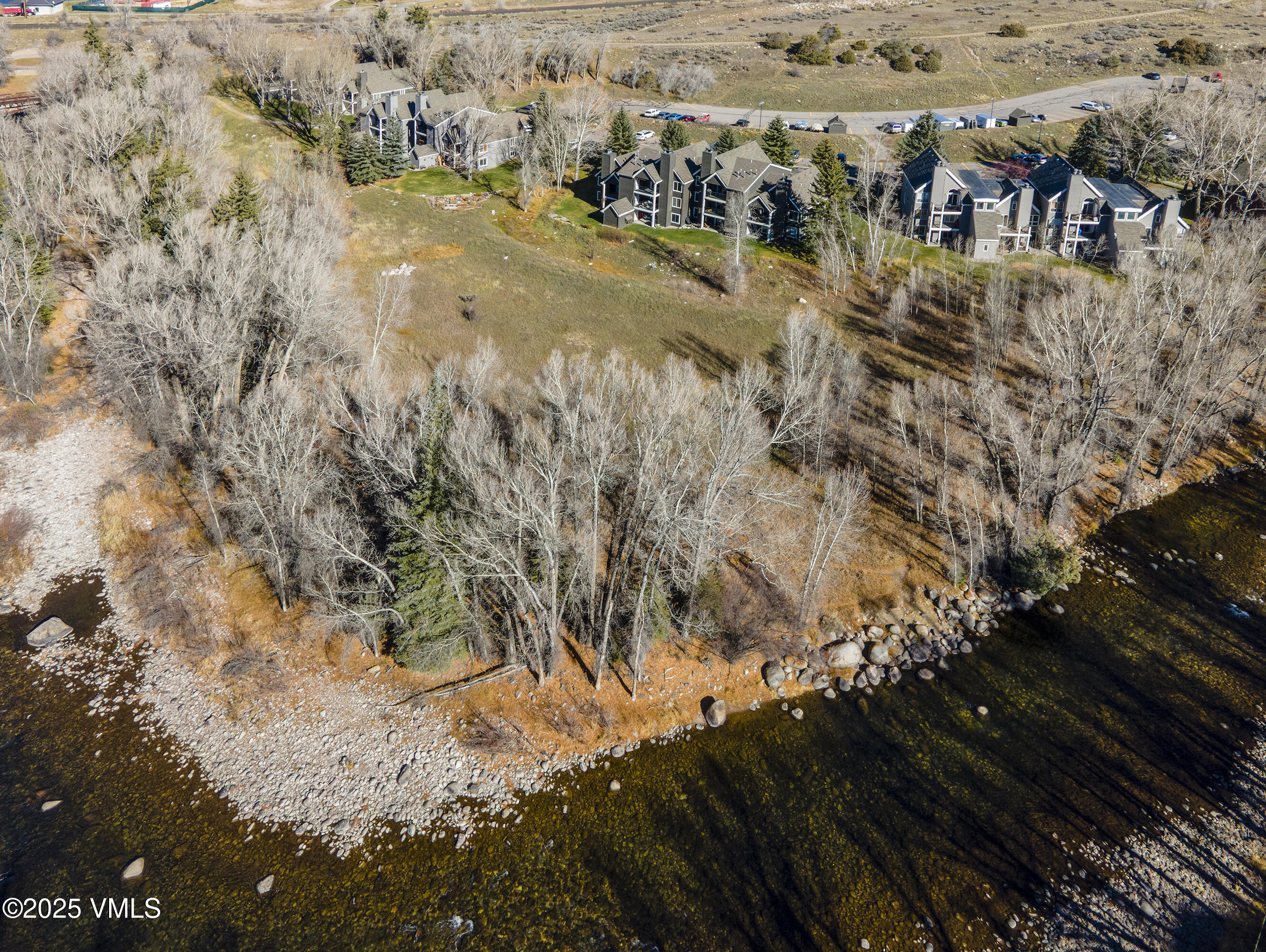34999 Highway 6, Unit O303 Edwards, CO 81632 - Photo 8 of 35 a view of residential houses with yard