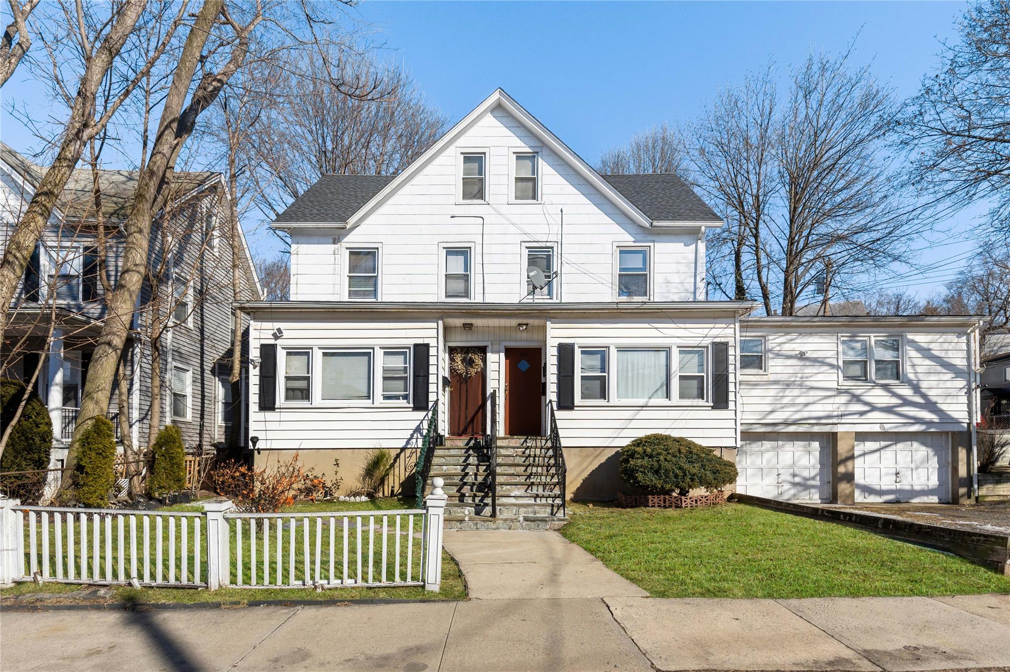 236-238 Purchase Street Rye, NY 10580 - Photo 2 of 15 View of front of house - Virtually Landscaped.