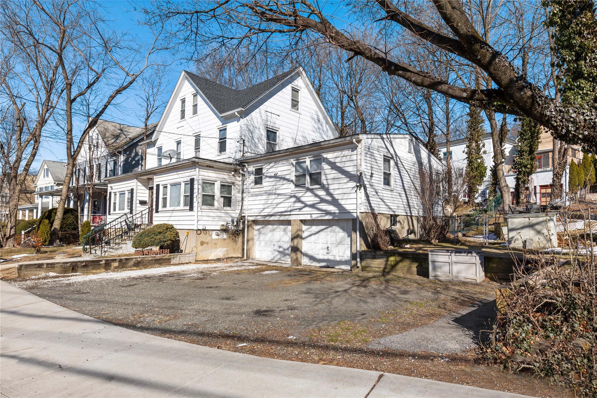 236-238 Purchase Street Rye, NY 10580 - Photo 3 of 15 View of home's exterior featuring a two car garage w/additional parking.