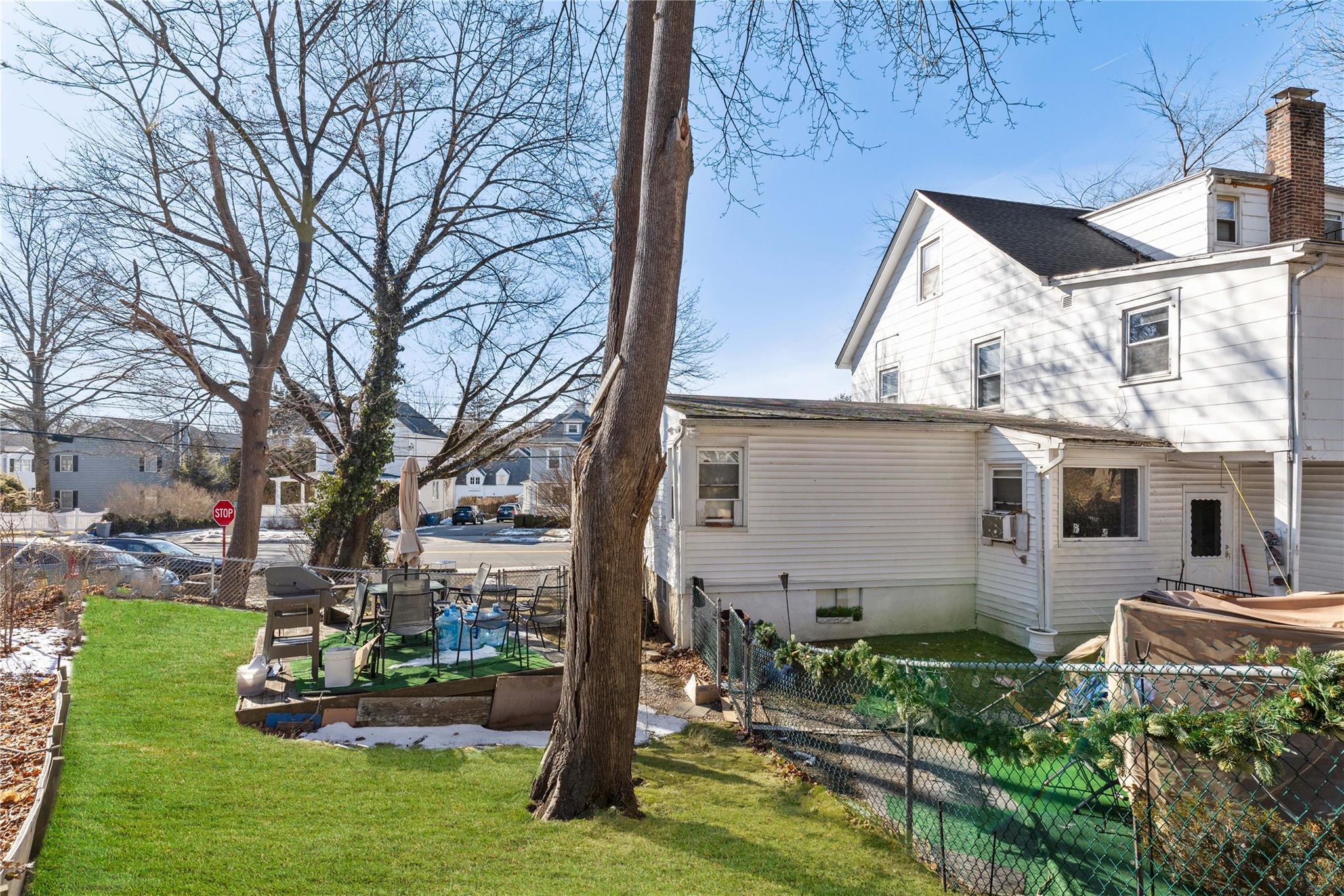 236-238 Purchase Street Rye, NY 10580 - Photo 6 of 15 Virtual view of back of property. featuring cooling unit and a yard