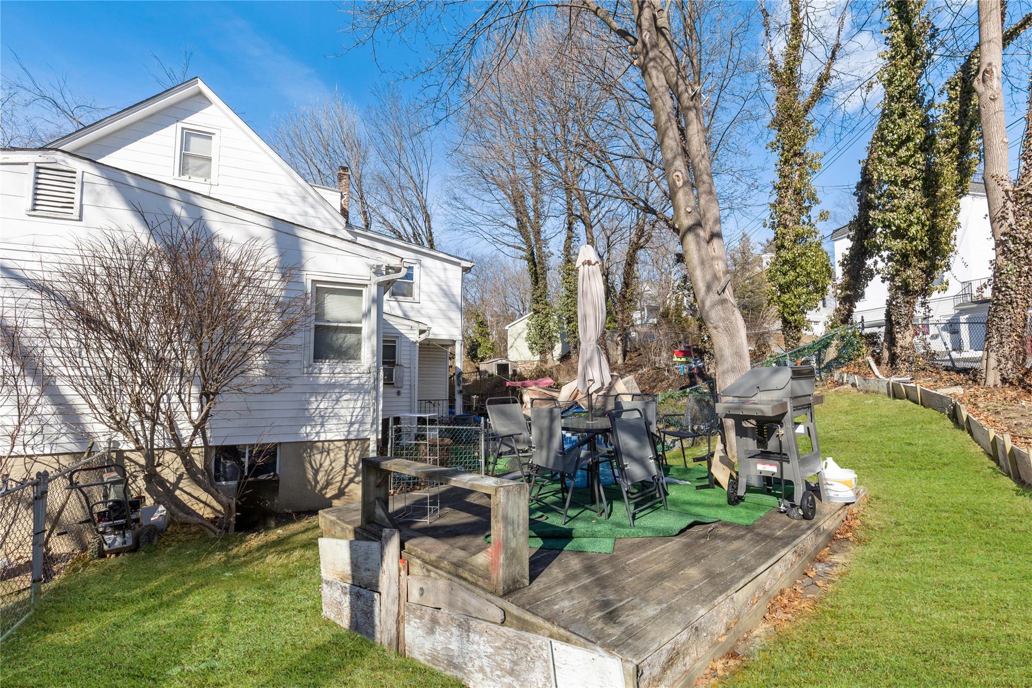 236-238 Purchase Street Rye, NY 10580 - Photo 8 of 15 View of yard with deck - virtual grass.