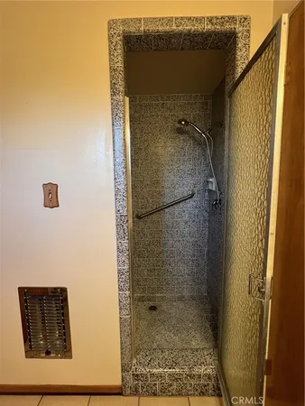 a bathroom with a sink vanity and a toilet