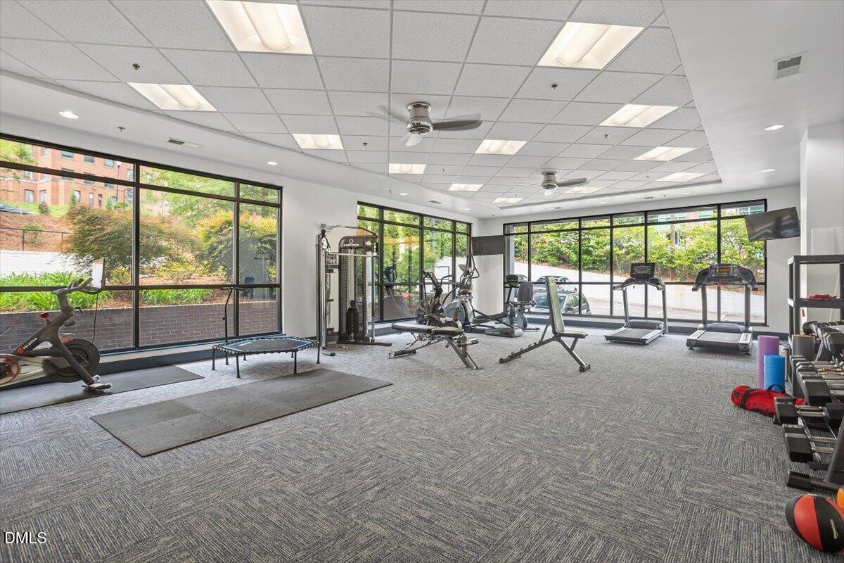 1300 St Marys Street, Unit 207 Raleigh, NC 27605 - Photo 30 of 31 a view of a room with gym equipment