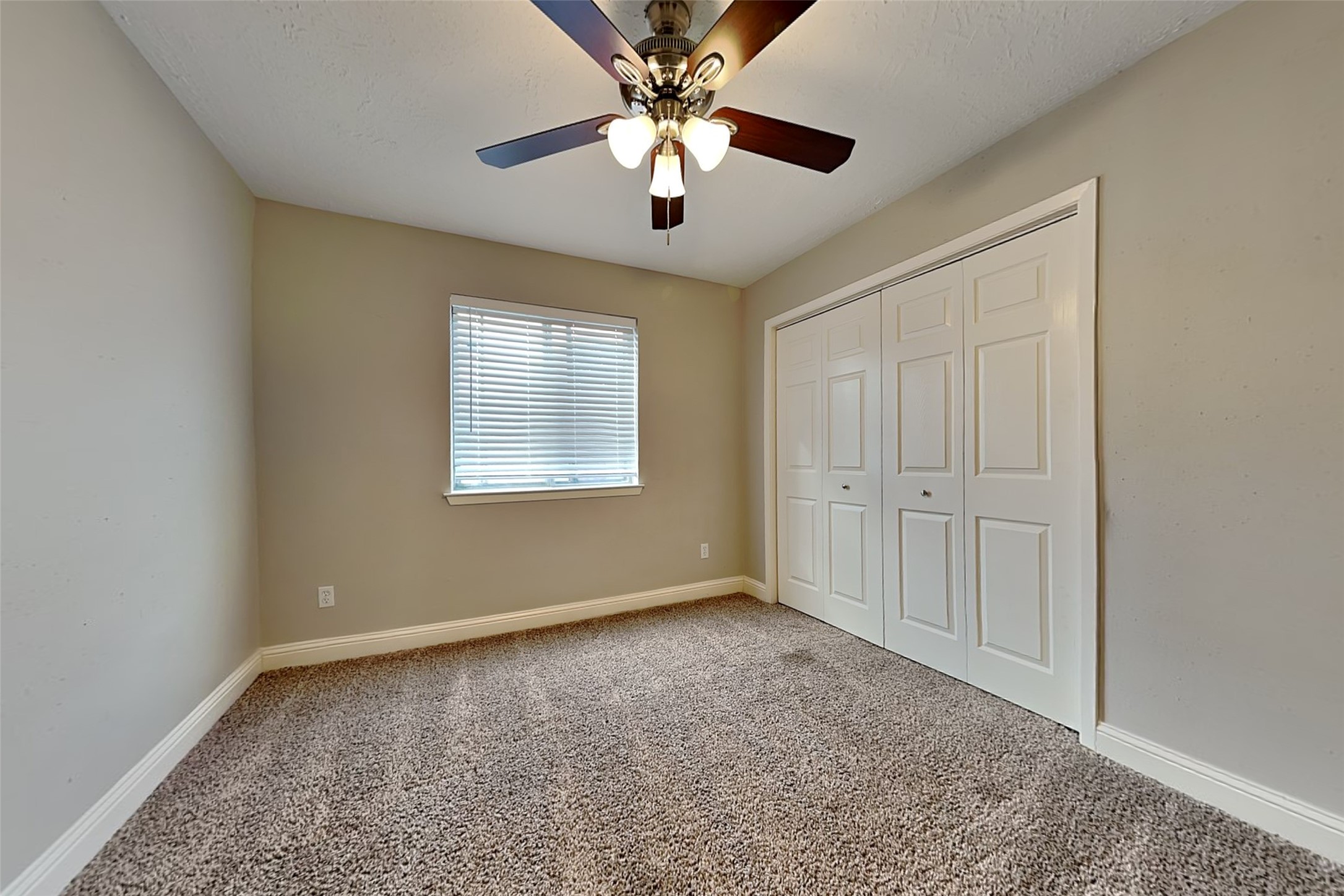 19902 Pinefield Court Humble, TX 77338 - Photo 15 of 23 a view of an empty room with a window
