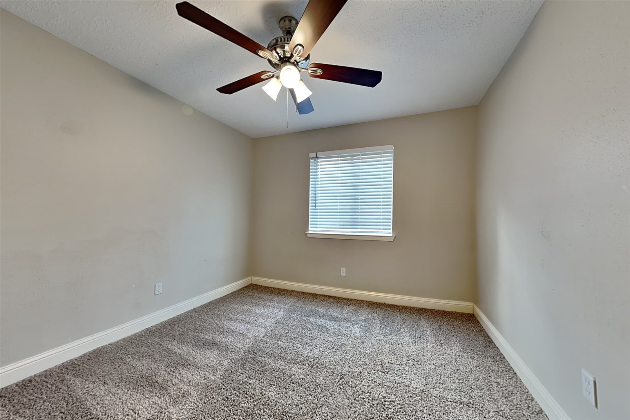 19902 Pinefield Court Humble, TX 77338 - Photo 16 of 23 an empty room with a window