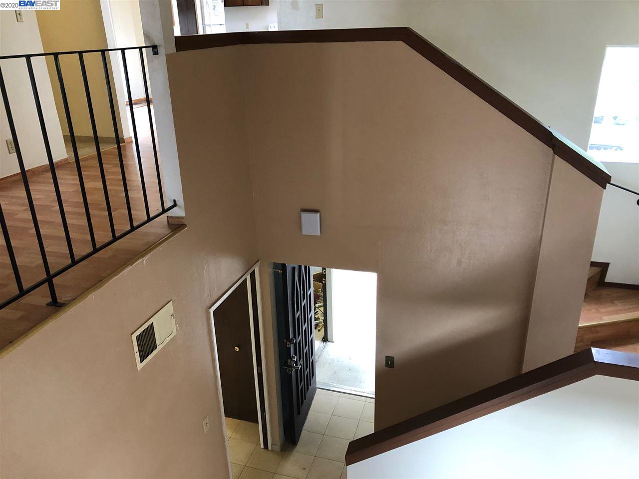 25717 Spring Drive Hayward, CA 94542 - Photo 10 of 13 a view of staircase with wooden floor