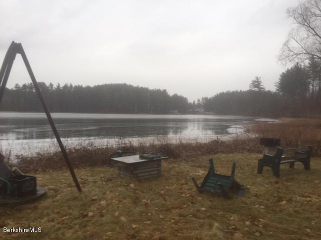 1567 Barber Pond Road Pownal, VT 05261 - Photo 10 of 14 a view of lake with mountain