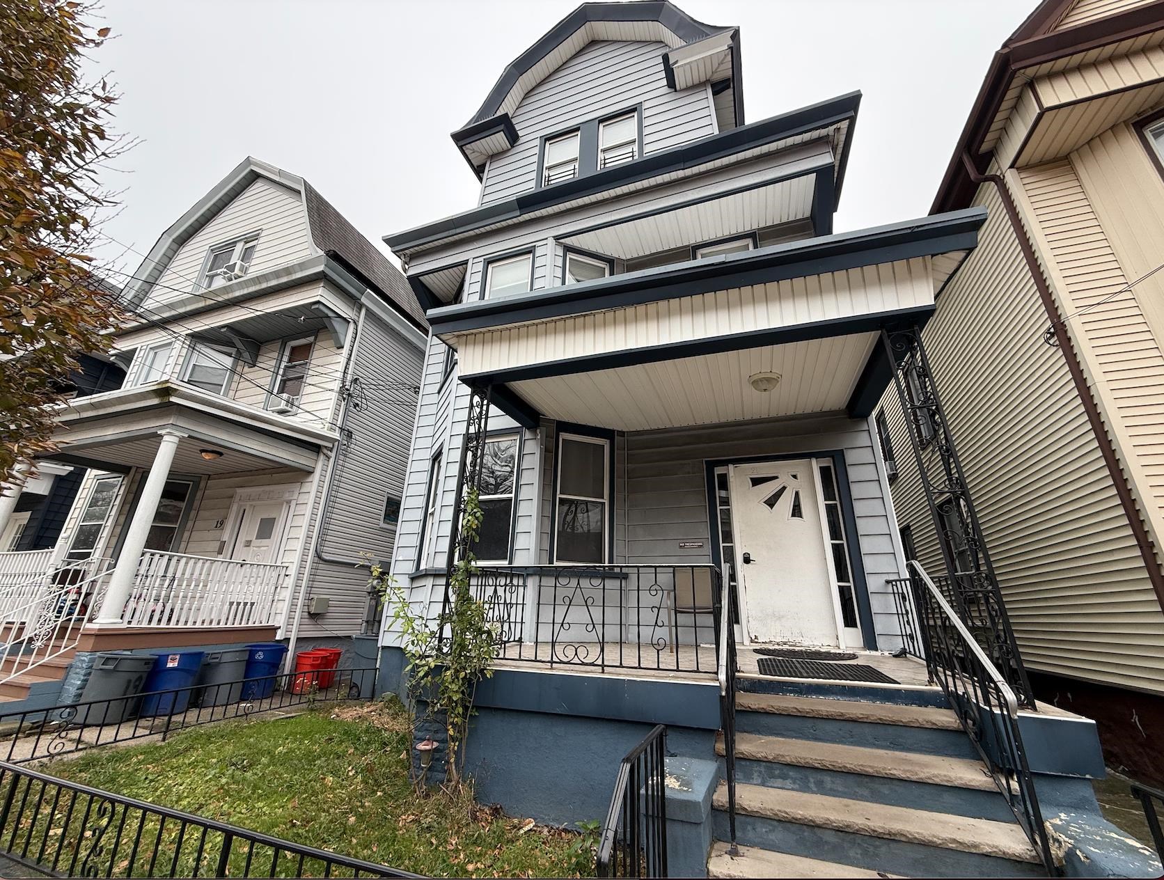 21 49th Street, Unit 3 Weehawken, NJ 07086 - Photo 1 of 5 front view of a house with a balcony