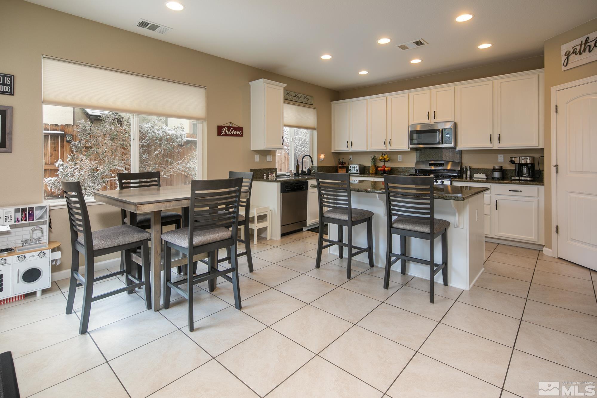 2225 Hope Valley Drive Reno, NV 89521 - Photo 6 of 31 a view of a dining area with furniture