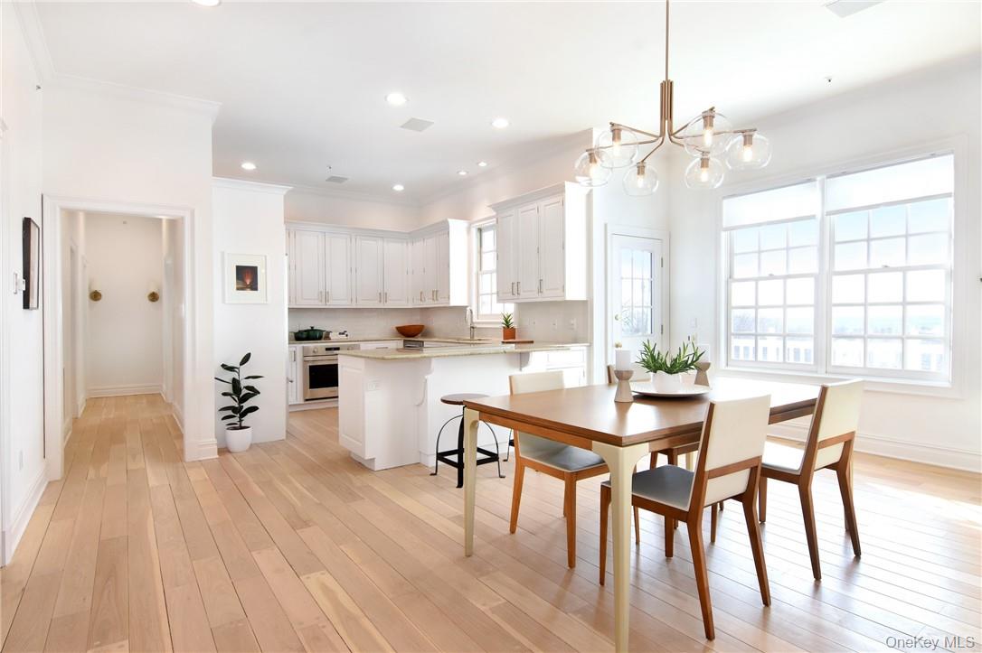 10 Castle Road Irvington, NY 10533 - Photo 6 of 13 Kitchen with doors to deck and views of yard.
