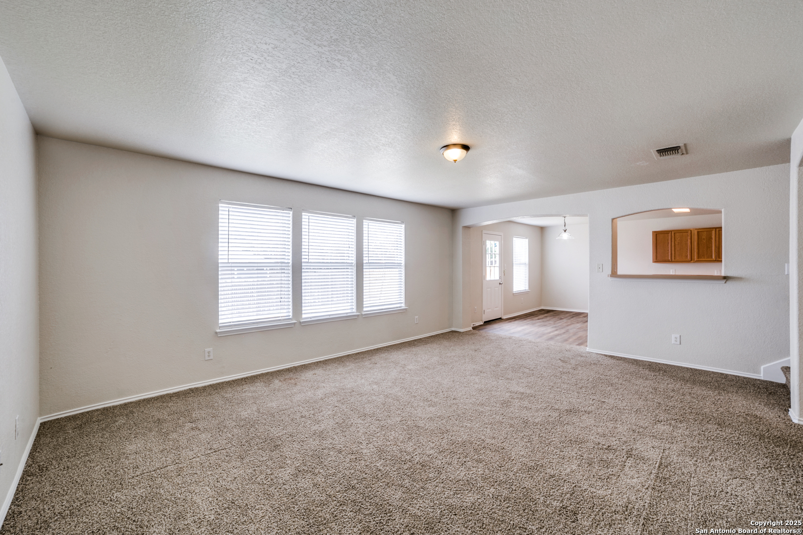 5616 Poppy Seed Run Leon Valley, TX 78238 - Photo 20 of 42 an empty room with windows