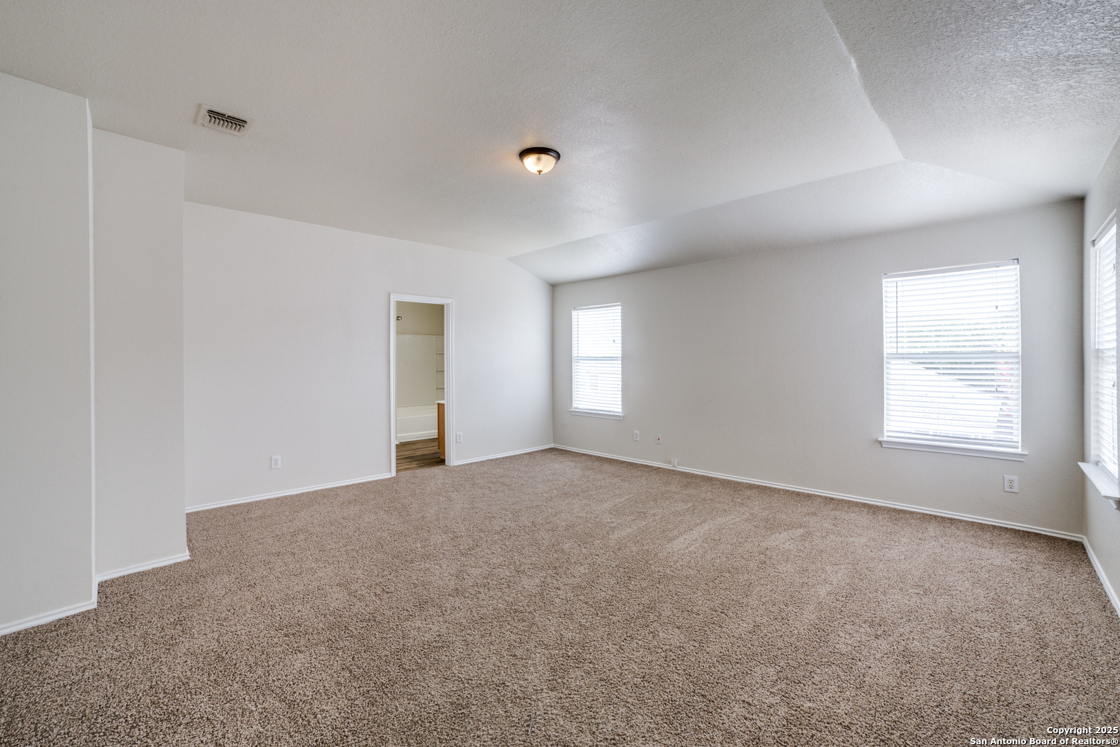 5616 Poppy Seed Run Leon Valley, TX 78238 - Photo 28 of 42 a view of an empty room with a window
