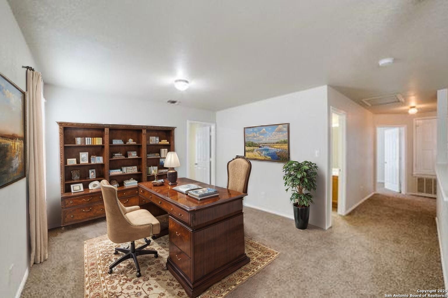 5616 Poppy Seed Run Leon Valley, TX 78238 - Photo 7 of 42 a workspace with furniture and rug