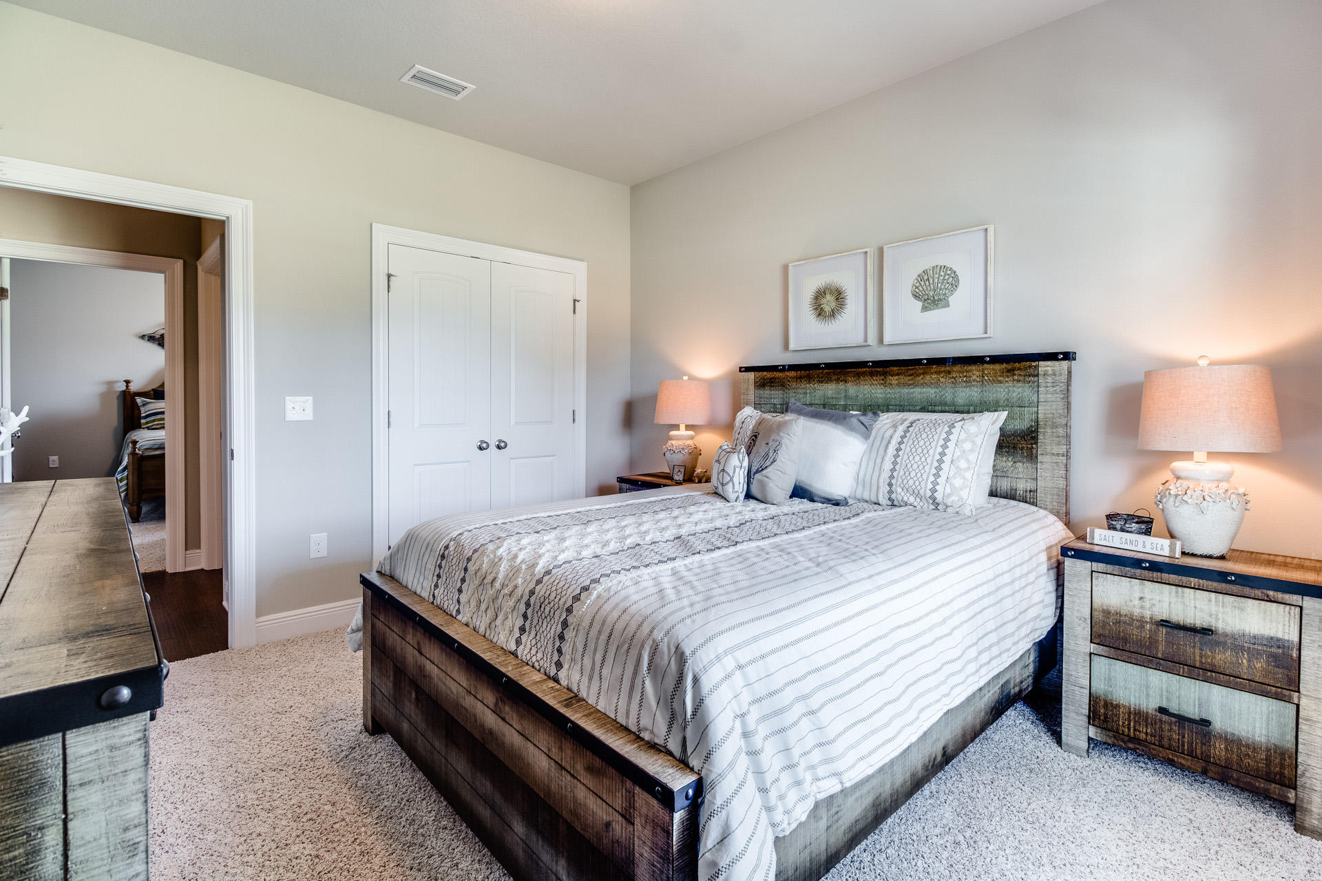 210 Conner Circle Santa Rosa Beach, FL 32459 - Photo 17 of 30 a bedroom with a bed and lamp