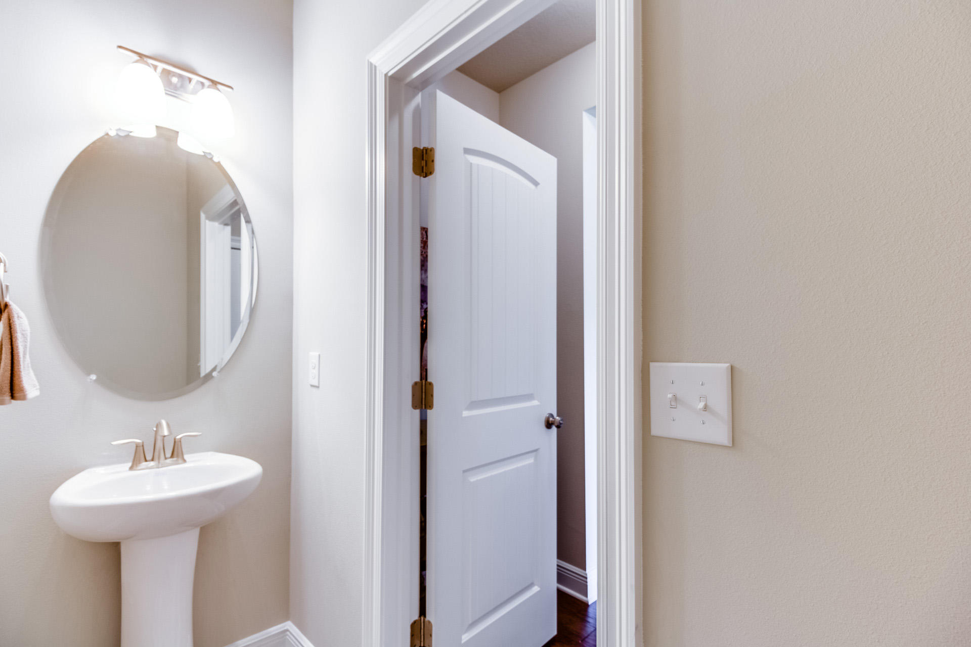 210 Conner Circle Santa Rosa Beach, FL 32459 - Photo 28 of 30 a bathroom with a sink and a mirror