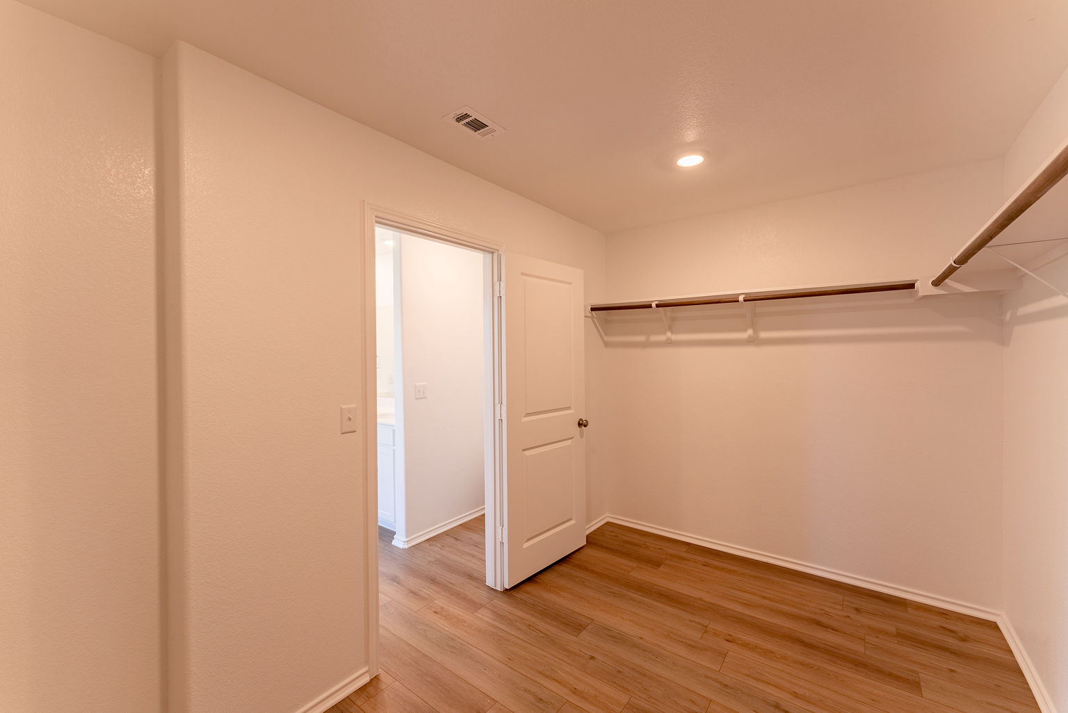 137 River Rise Road Kyle, TX 78640 - Photo 14 of 26 Walk in closet featuring light wood-type flooring
