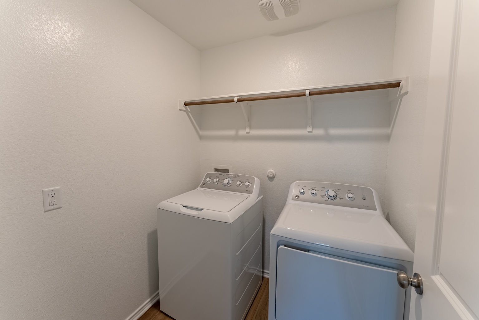 137 River Rise Road Kyle, TX 78640 - Photo 15 of 26 Laundry room featuring separate washer and dryer