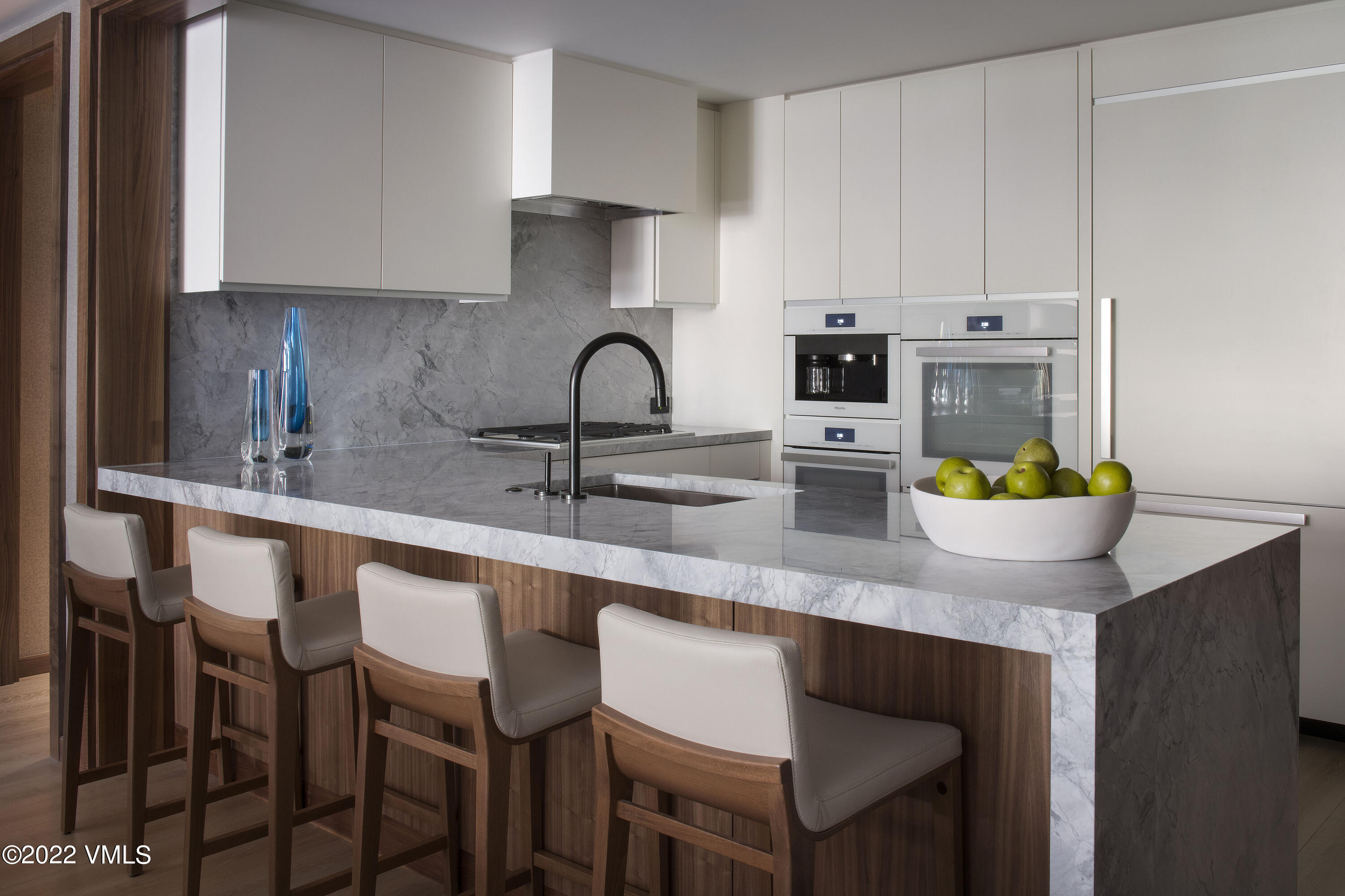 1 Vail Road, Unit 6103 Vail, CO 81657 - Photo 10 of 26 a kitchen with stainless steel appliances a sink and a stove