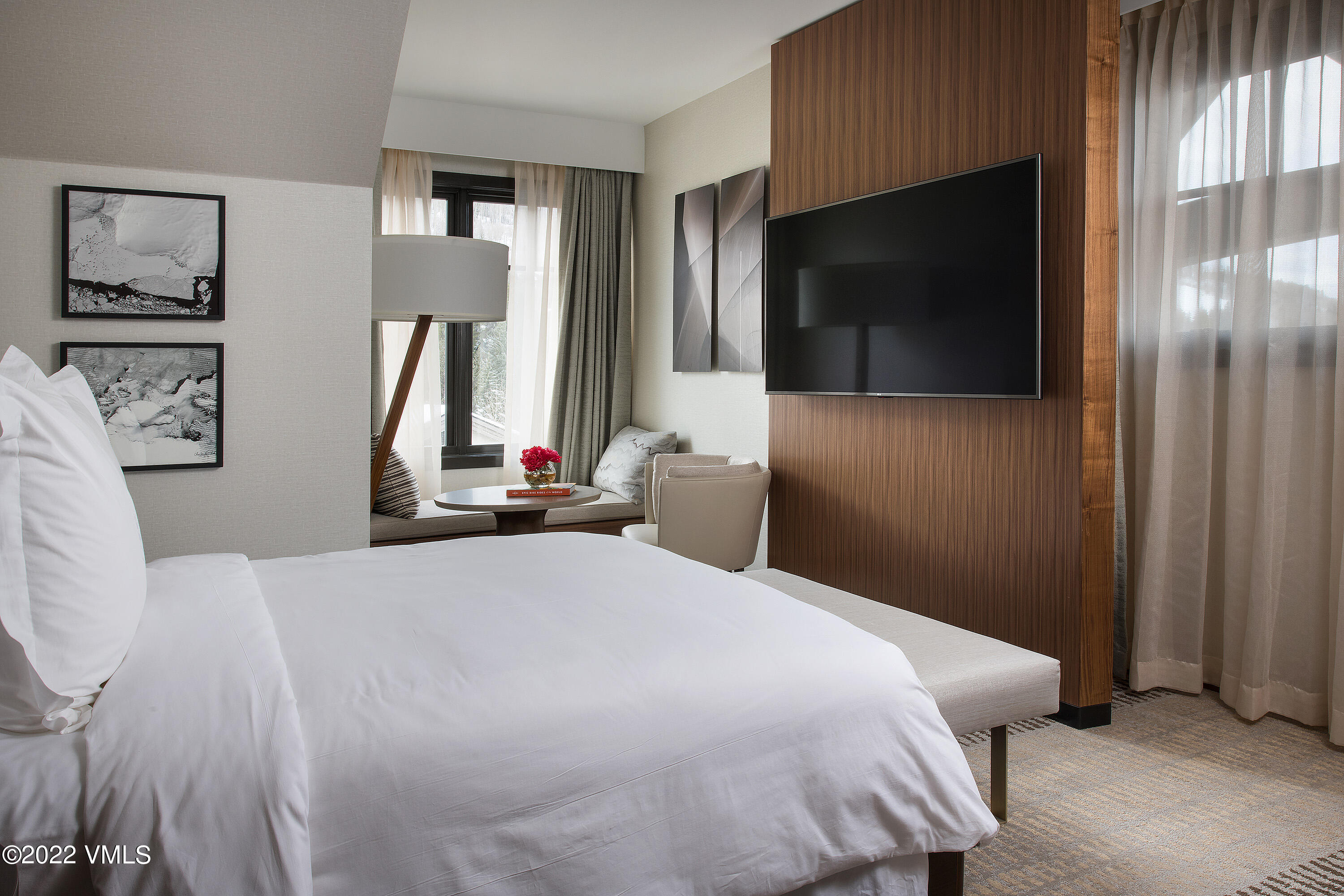 1 Vail Road, Unit 6103 Vail, CO 81657 - Photo 21 of 26 a bedroom with a bed and a flat screen tv