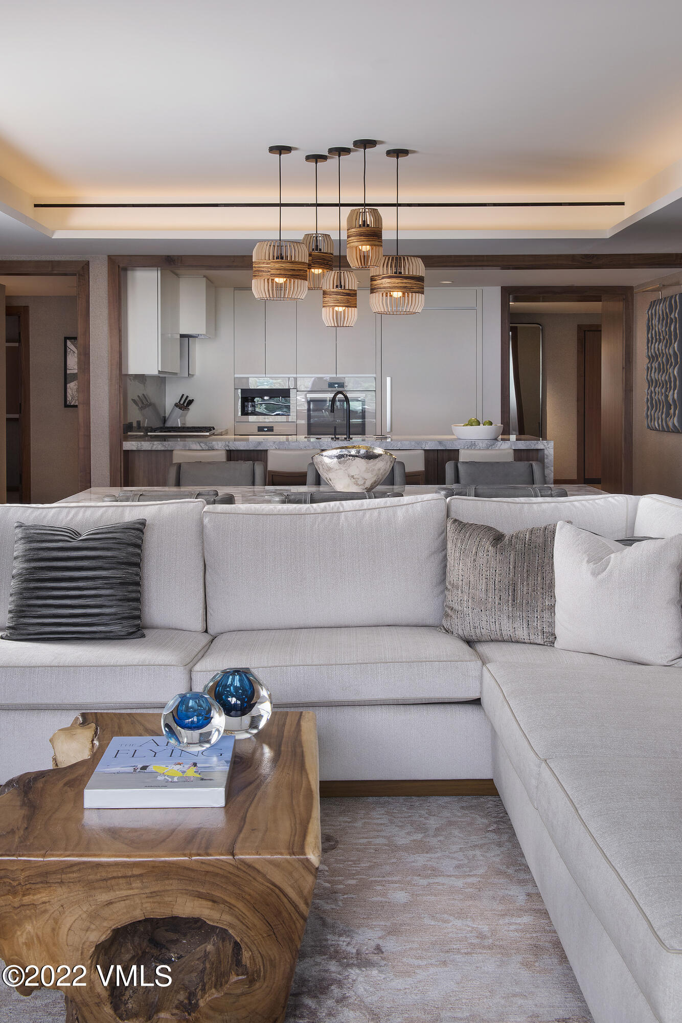 1 Vail Road, Unit 6103 Vail, CO 81657 - Photo 4 of 26 a living room with furniture and a table