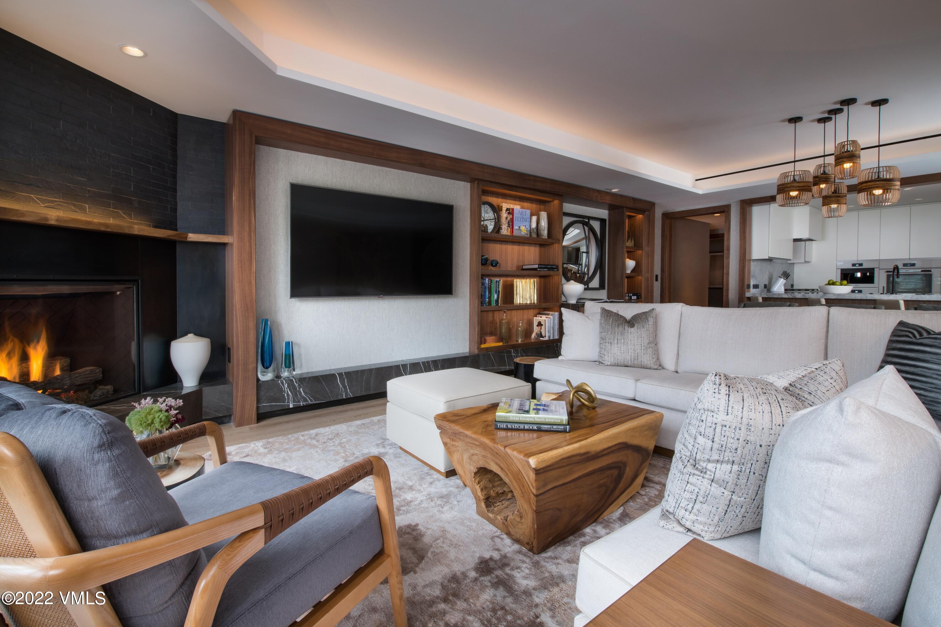 1 Vail Road, Unit 6103 Vail, CO 81657 - Photo 5 of 26 a living room with furniture and a flat screen tv