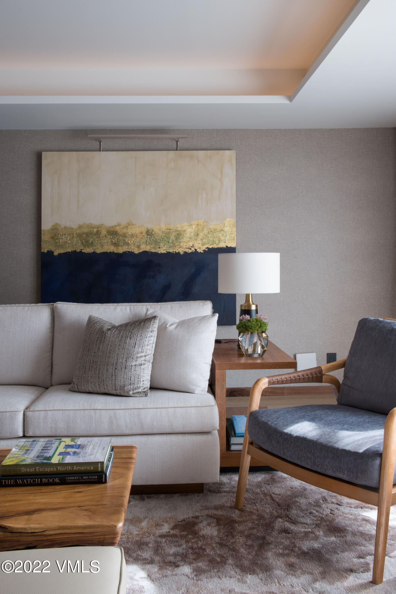 1 Vail Road, Unit 6103 Vail, CO 81657 - Photo 8 of 26 a living room with furniture and a rug