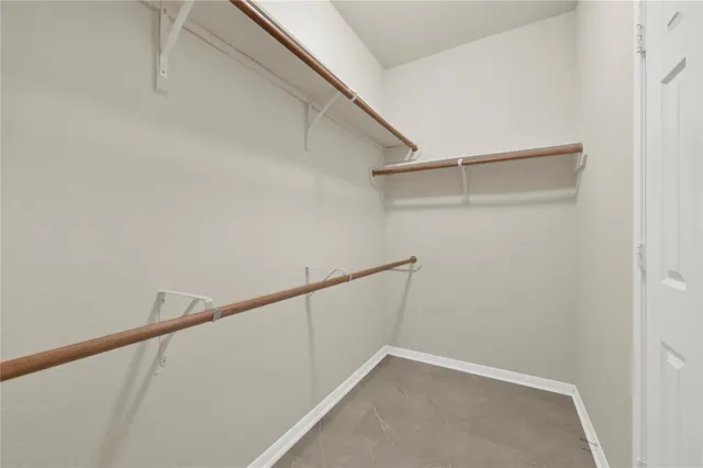 a view of an empty walk in closet