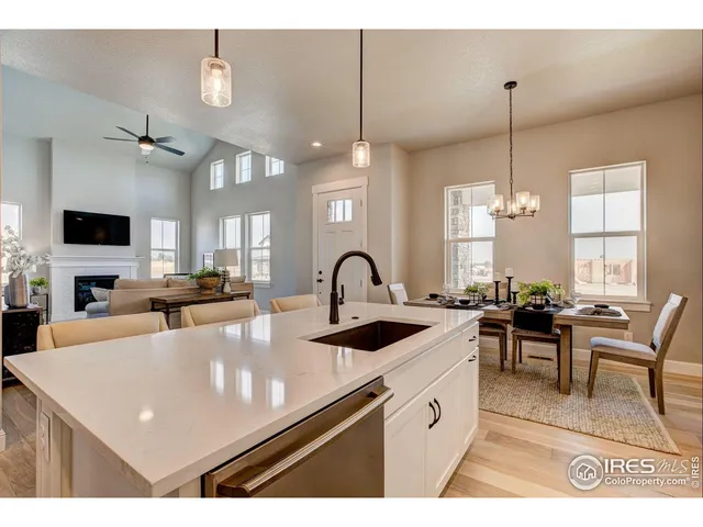 a kitchen with appliances and cabinets