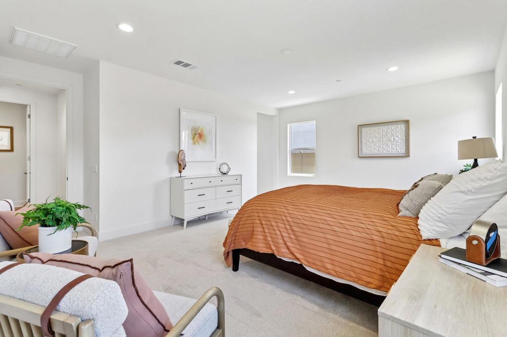 3521 Butler Place Escondido, CA 92027 - Photo 29 of 50 a bedroom with a bed and dresser