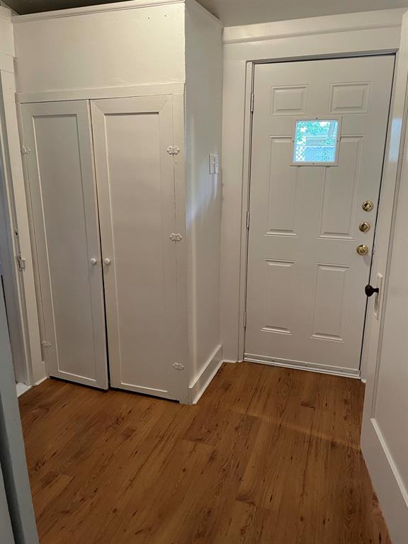2257 College Avenue Fort Worth, TX 76110 - Photo 15 of 26 an empty room with wooden floor and closet