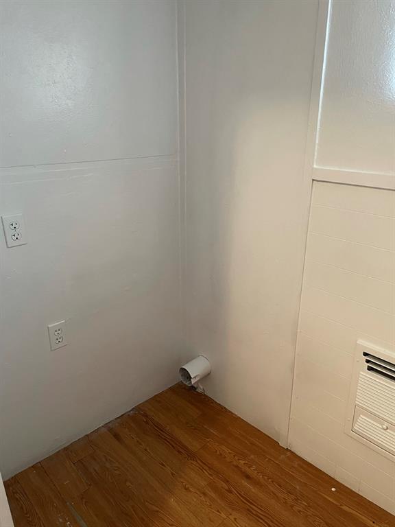 2257 College Avenue Fort Worth, TX 76110 - Photo 17 of 26 a view of a room with wooden floor