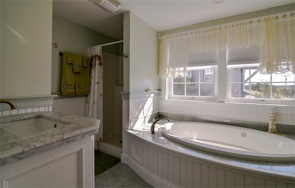 273 Phillips Road Sandwich, MA 02563 - Photo 18 of 30 a bathroom with a granite countertop sink and a mirror