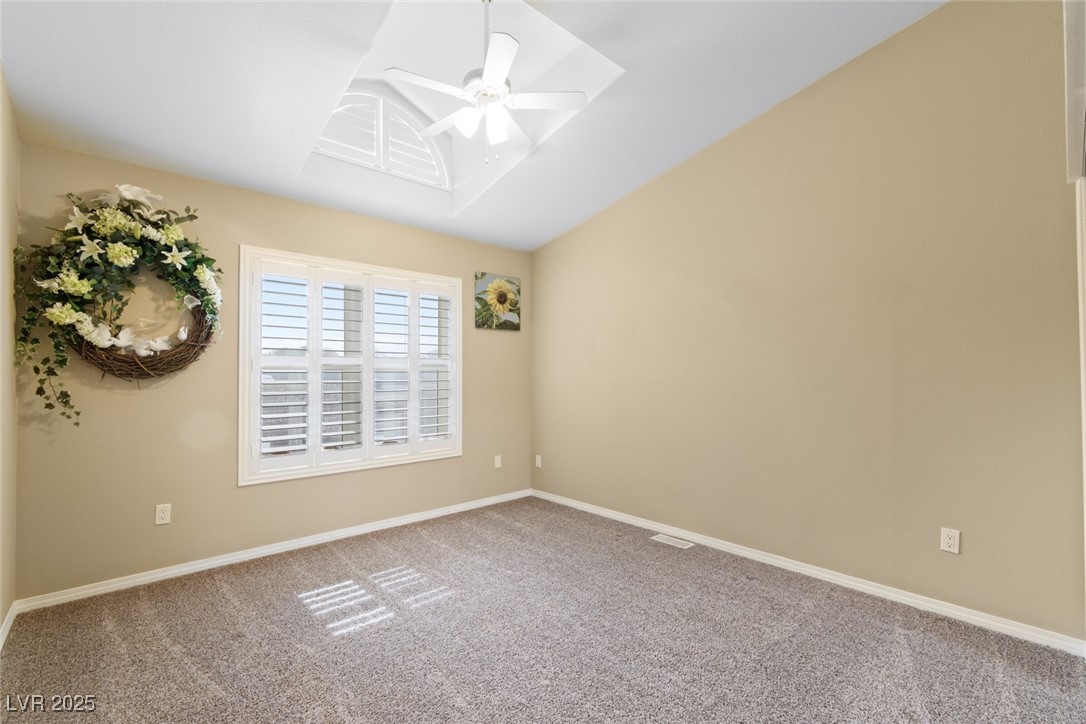 5782 Saddletree Road Pahrump, NV 89061 - Photo 17 of 30 Guest Room 1 with fan, light, shutters and mirrored closet