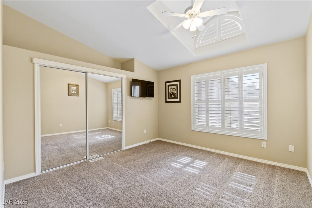 5782 Saddletree Road Pahrump, NV 89061 - Photo 18 of 30 Guest Room 2 with fan, light, shutters and mirrored closet