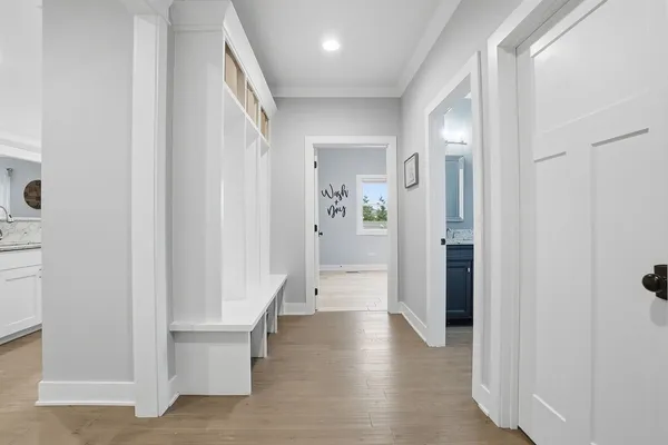 a bedroom with a bed and a ceiling fan